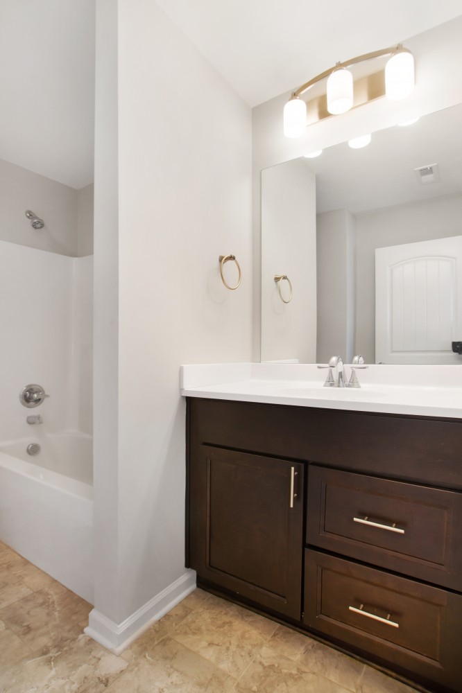 113 Cages Road, Unit 3 Hendersonville, TN 37075 - Photo 18 of 30 a bathroom with a sink vanity and mirror