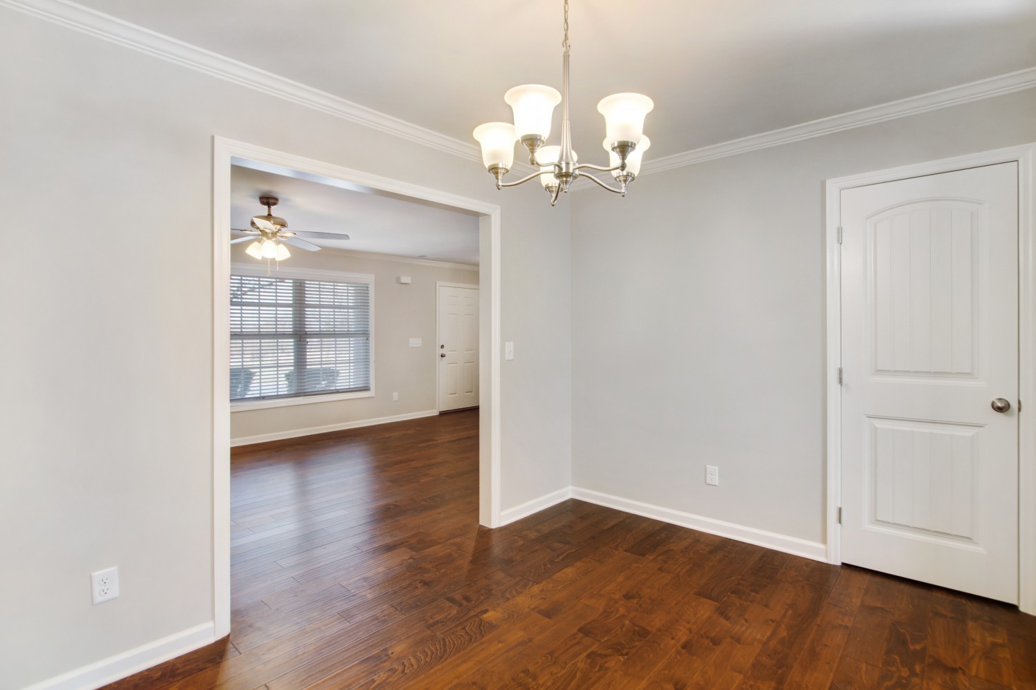 113 Cages Road, Unit 3 Hendersonville, TN 37075 - Photo 9 of 30 a view of an empty room with wooden floor and a window
