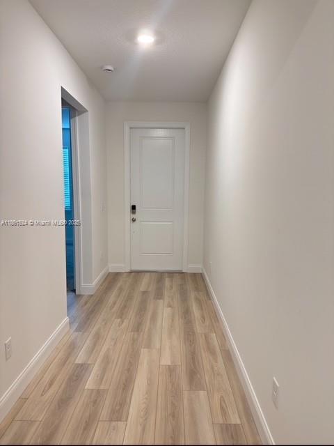 6576 Cloverdale Avenue Port St. Lucie, FL 34987 - Photo 17 of 32 a view of a room with wooden floor