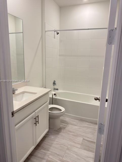 6576 Cloverdale Avenue Port St. Lucie, FL 34987 - Photo 23 of 32 a bathroom with a granite countertop sink toilet and shower