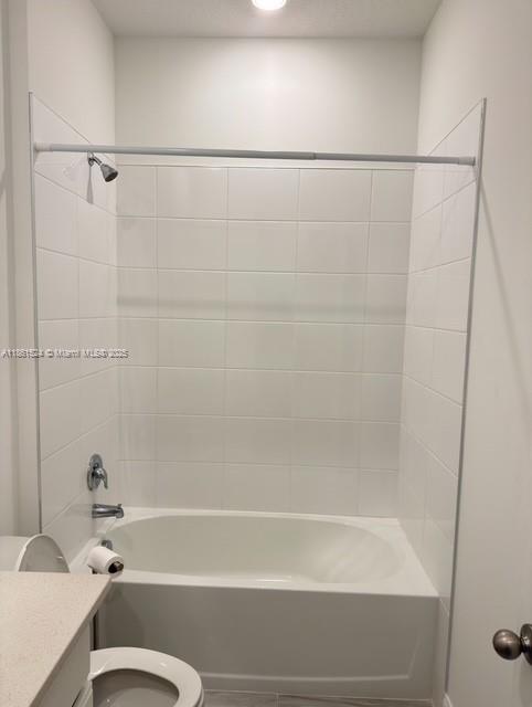 6576 Cloverdale Avenue Port St. Lucie, FL 34987 - Photo 24 of 32 a bathroom with a shower and a bathtub