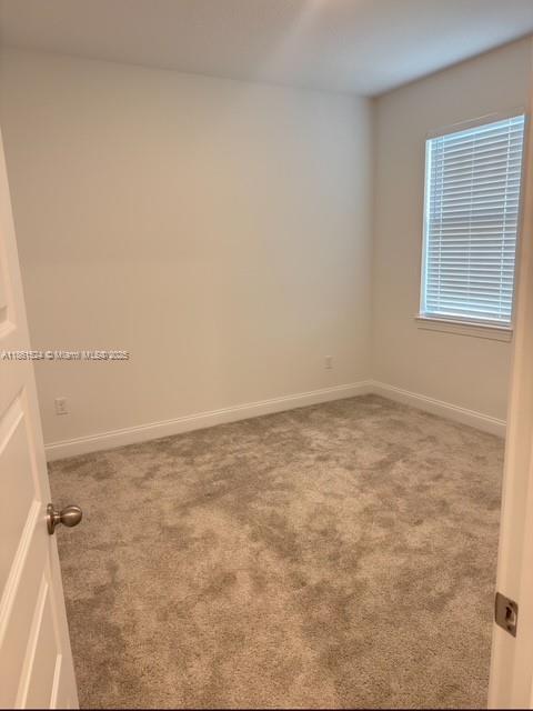 6576 Cloverdale Avenue Port St. Lucie, FL 34987 - Photo 26 of 32 wooden floor in an empty room