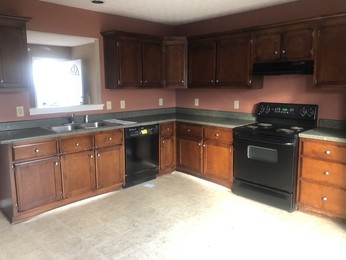 324 Bandera Lane Springfield, TN 37172 - Photo 9 of 11 a kitchen with sink a stove and cabinets