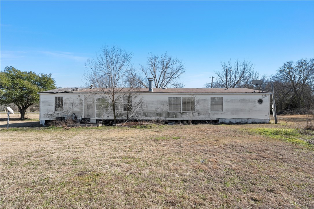 3725 Bluhm Road West, TX 76691 - Photo 15 of 26 a view of a yard with a house
