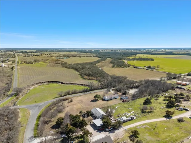 an aerial view of beach and ocean