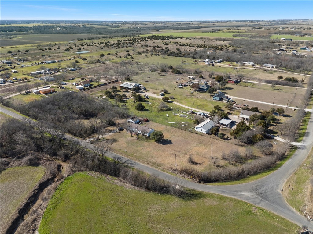 3725 Bluhm Road West, TX 76691 - Photo 22 of 26 an aerial view of a house with a yard