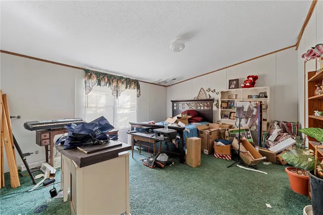 a view of room with workspace and toys