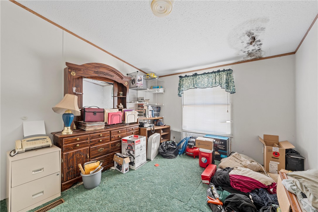 3725 Bluhm Road West, TX 76691 - Photo 6 of 26 a view of room with workspace and toys
