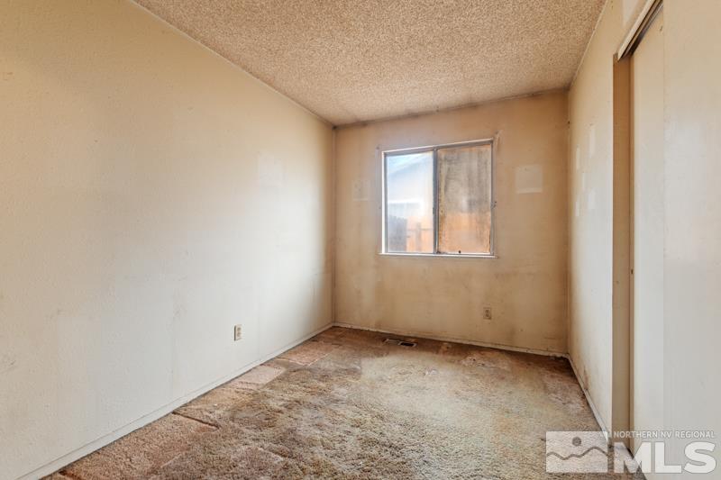 1376 Butler Street Reno, NV 89512 - Photo 11 of 12 a view of an empty room with a window