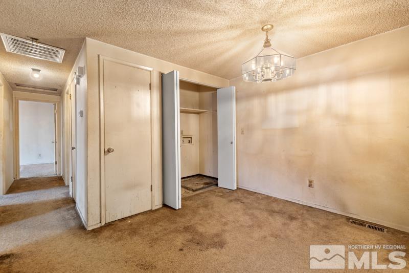 1376 Butler Street Reno, NV 89512 - Photo 3 of 12 a view of a chandelier in a room