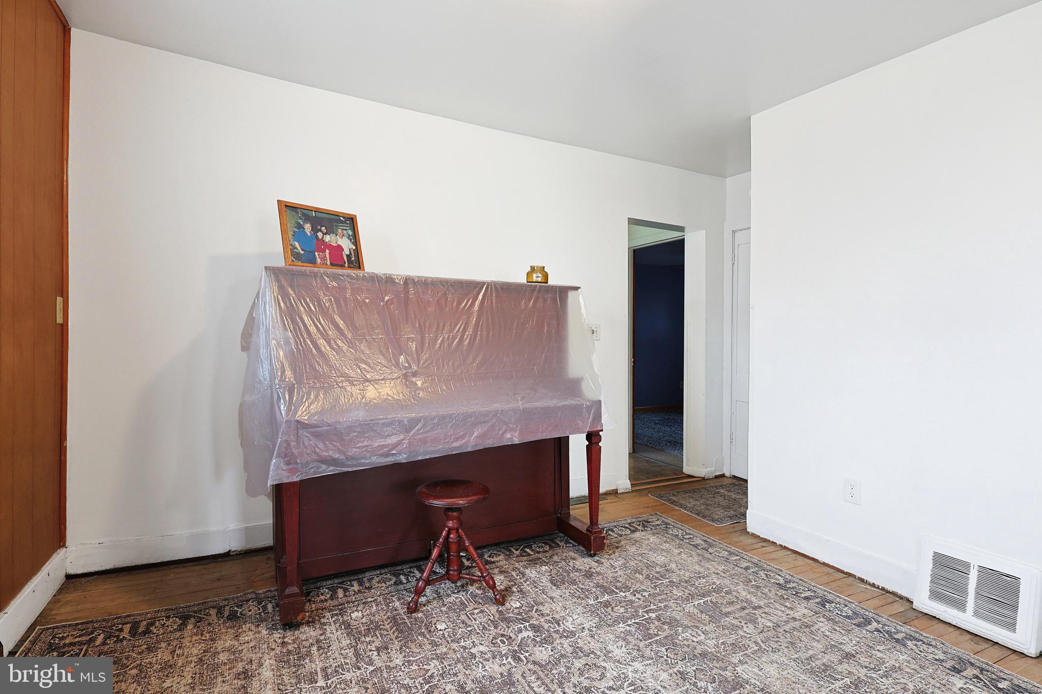 159 Rocket Center Road Keyser, WV 26726 - Photo 12 of 64 a room with furniture and a wooden floor