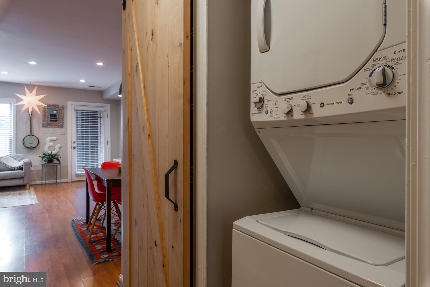 32 15th Street Northeast, Unit 32 Washington, DC 20003 - Photo 16 of 36 Barn door conceals washer/dryer