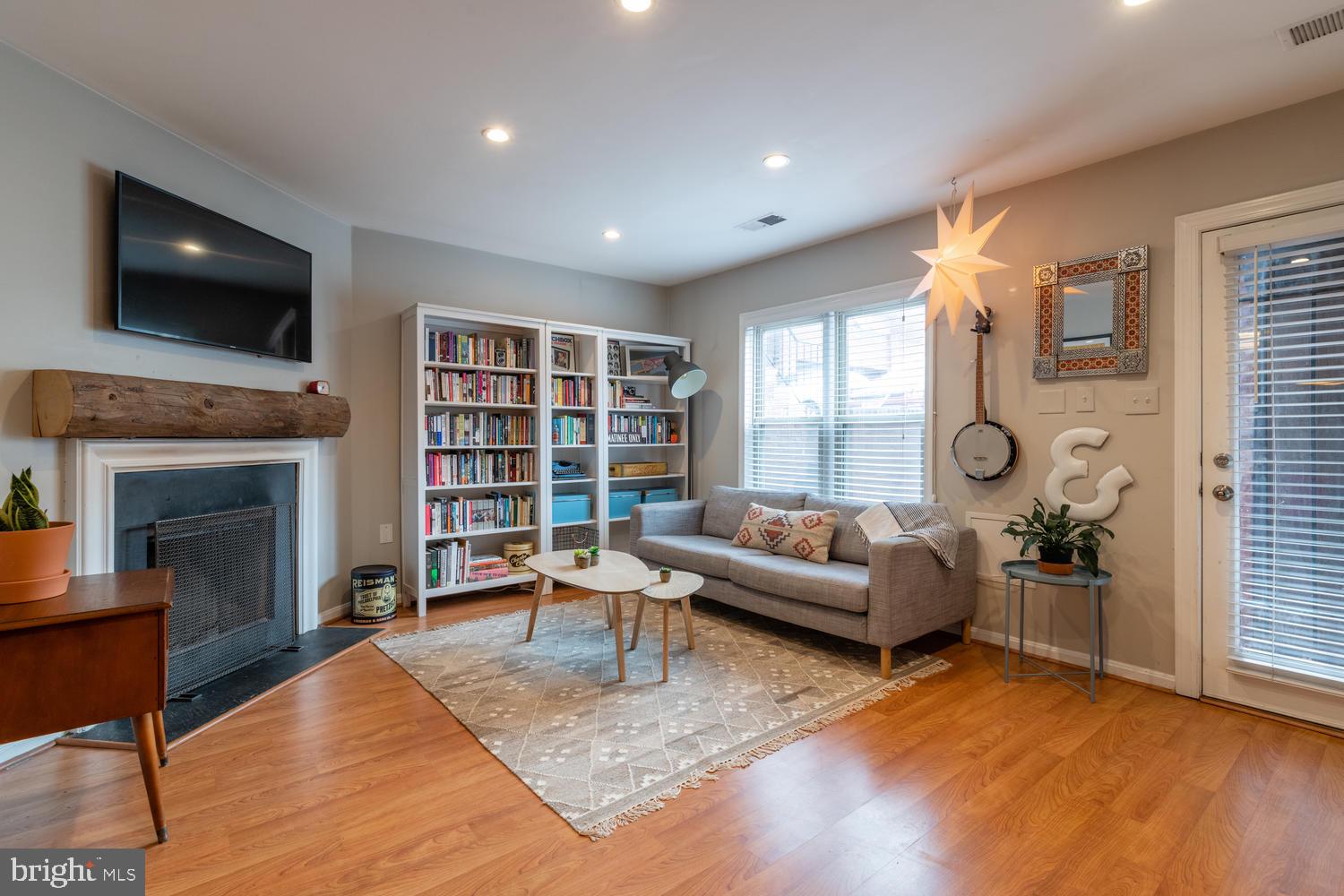 32 15th Street Northeast, Unit 32 Washington, DC 20003 - Photo 5 of 36 Wood burning fireplace w/fun mantel