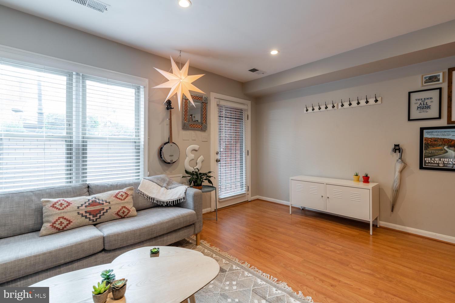 32 15th Street Northeast, Unit 32 Washington, DC 20003 - Photo 6 of 36 Bright living area looking to entry