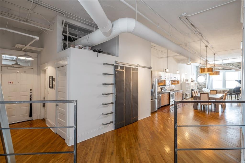 215 Mitchell Street Southwest, Unit 14 Atlanta, GA 30303 - Photo 15 of 37 a view of a kitchen with refrigerator and stove