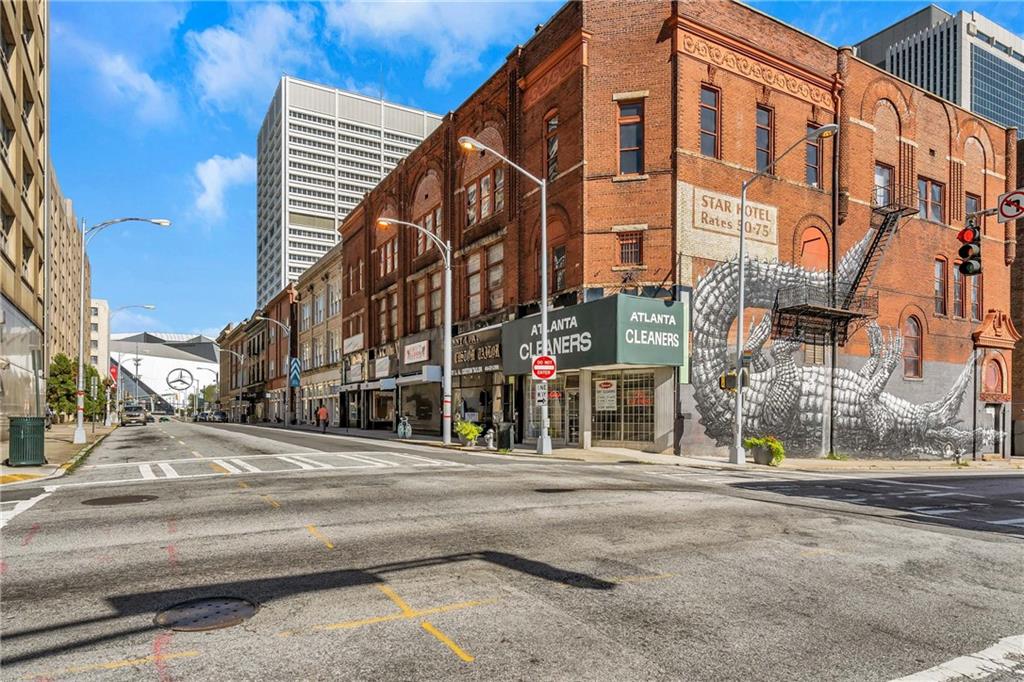 215 Mitchell Street Southwest, Unit 14 Atlanta, GA 30303 - Photo 3 of 37 a view of a building along the road