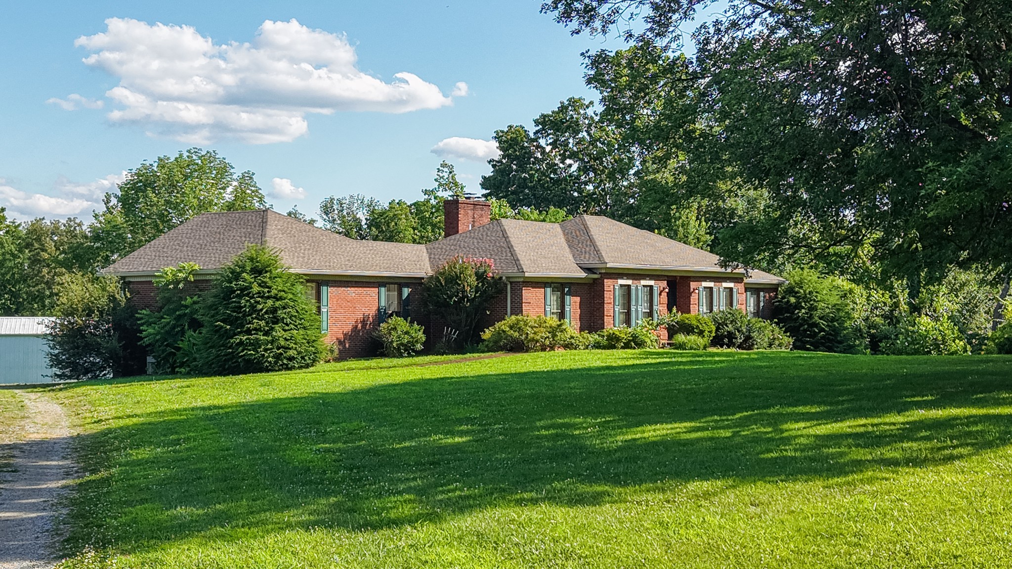 6931 Herbert Shannon Road Springfield, TN 37172 - Photo 14 of 34 a front view of a house with garden