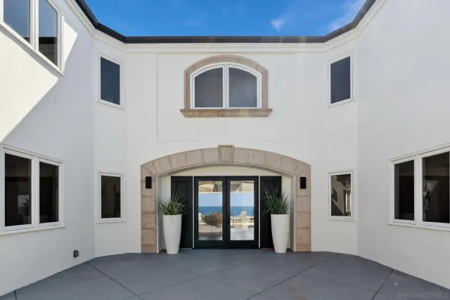 a front view of a house with a door