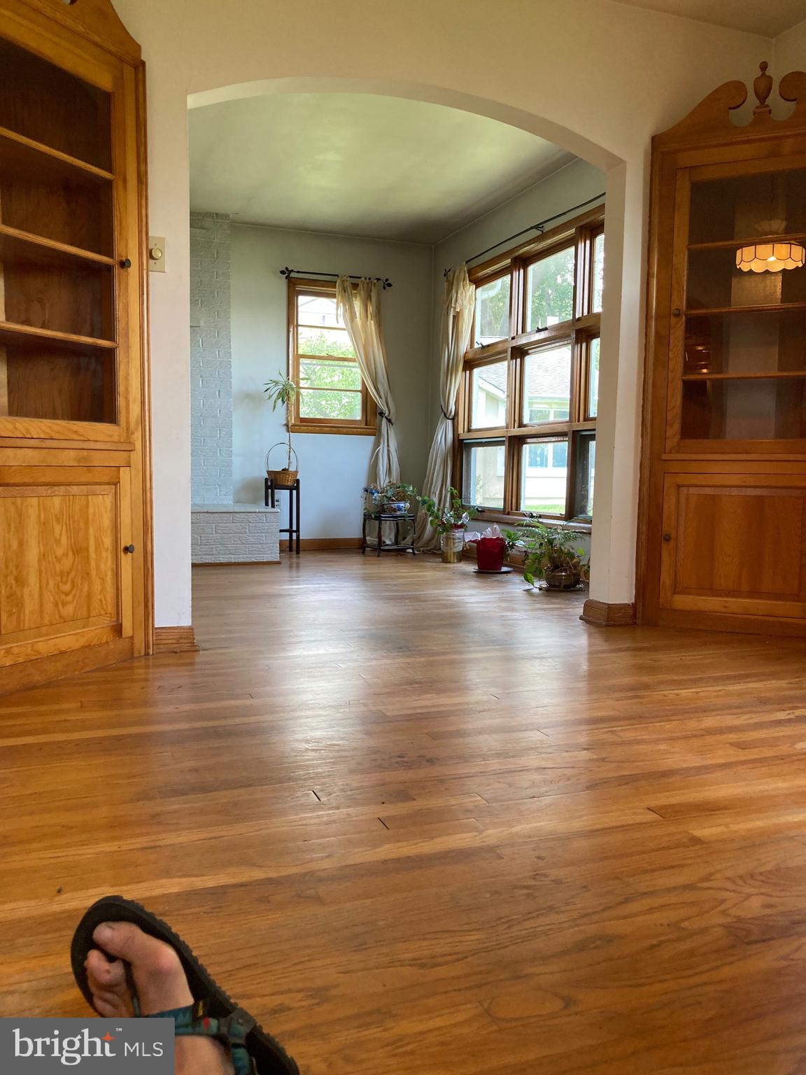 1930 Cedar Road Pasadena, MD 21122 - Photo 11 of 27 View from dining rm thru arched door to living rm