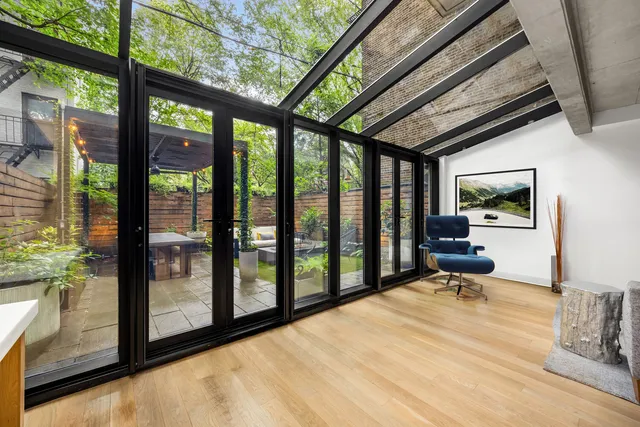 a living room with large windows