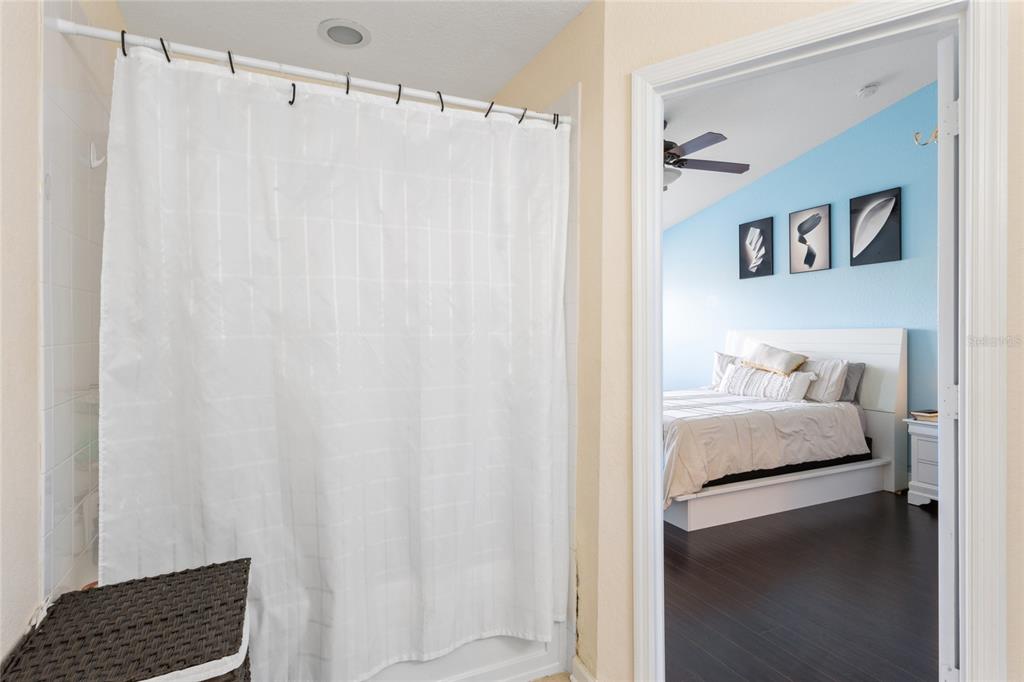 6435 Ranelagh Drive, Unit 104 Orlando, FL 32835 - Photo 20 of 36 a bedroom with a bed and a window