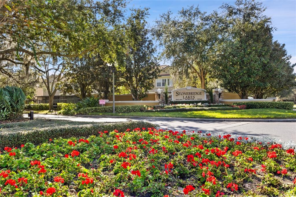 6435 Ranelagh Drive, Unit 104 Orlando, FL 32835 - Photo 35 of 36 a view of a house with swimming pool