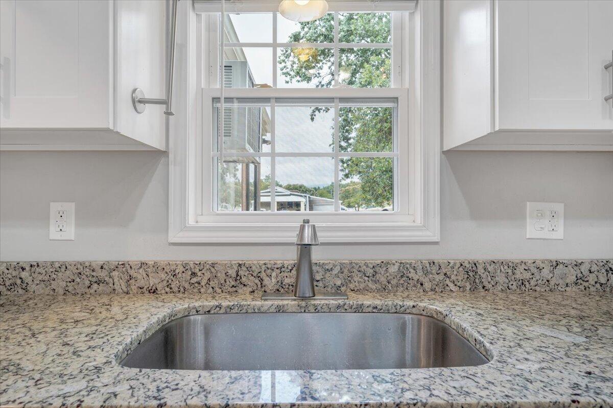 423 Turner Road Salem, VA 24153 - Photo 18 of 67 a kitchen with a sink cabinets and window