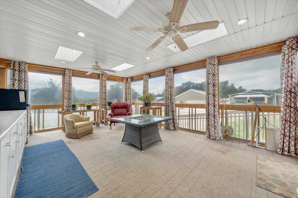 423 Turner Road Salem, VA 24153 - Photo 21 of 67 a living room with furniture and a large window