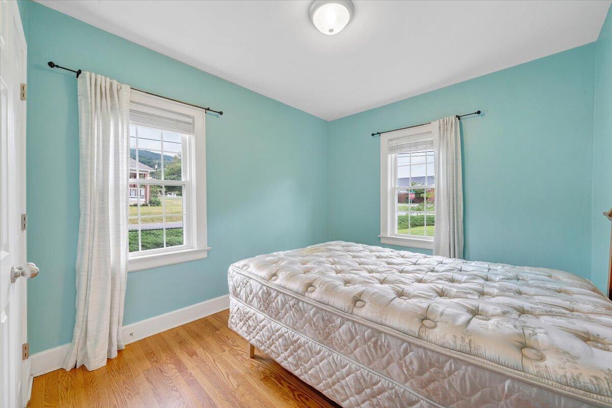 423 Turner Road Salem, VA 24153 - Photo 27 of 67 a bedroom with a bed and a window