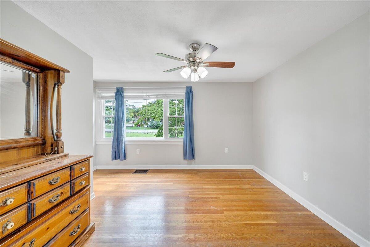 423 Turner Road Salem, VA 24153 - Photo 34 of 67 a view of room with wooden floor and fan
