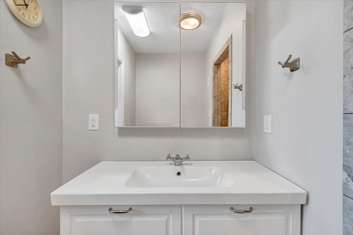 423 Turner Road Salem, VA 24153 - Photo 36 of 67 a bathroom with a sink and a mirror