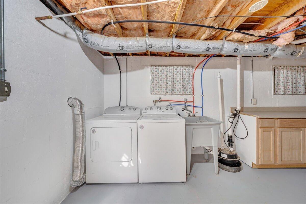 423 Turner Road Salem, VA 24153 - Photo 38 of 67 a view of a storage & utility room with a sink dryer and washer