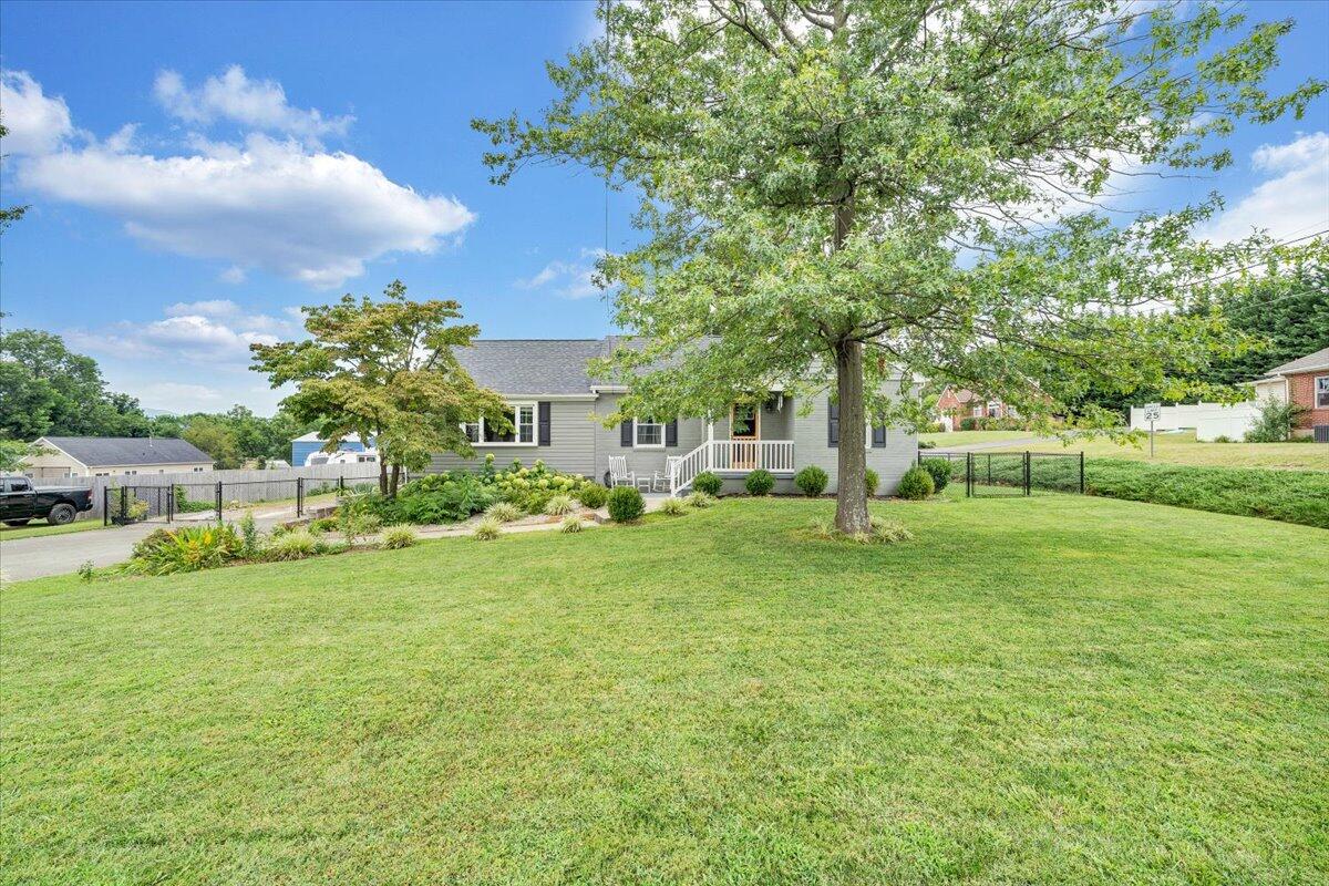 423 Turner Road Salem, VA 24153 - Photo 4 of 67 a view of a park with a house in the background