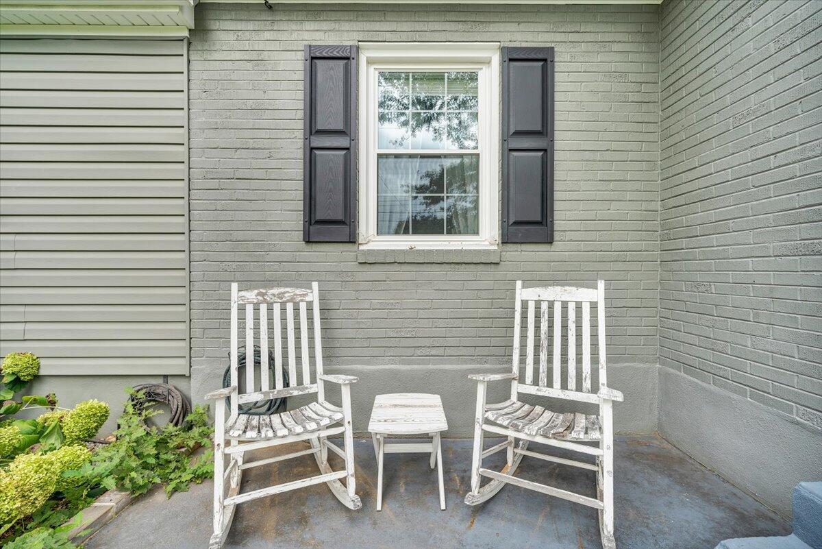 423 Turner Road Salem, VA 24153 - Photo 48 of 67 a chair and a table in a balcony