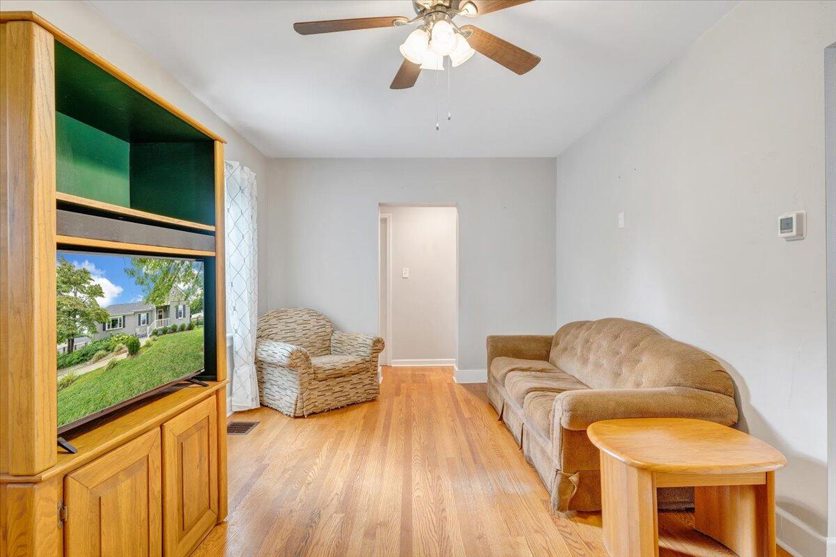 423 Turner Road Salem, VA 24153 - Photo 9 of 67 a living room with furniture and a flat screen tv
