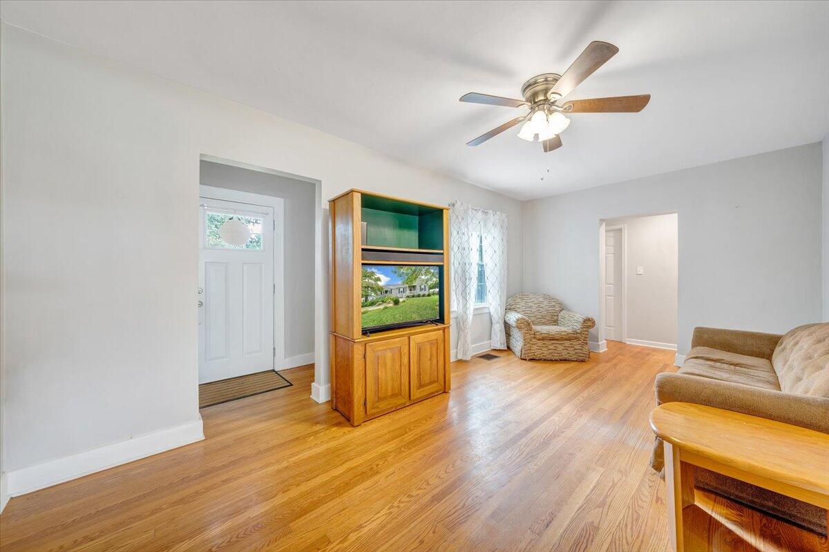 423 Turner Road Salem, VA 24153 - Photo 10 of 67 a living room with furniture and a wooden floor