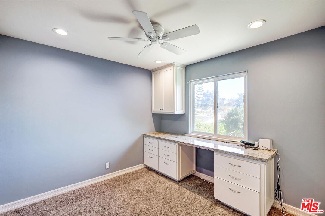 2868 Rutgers Place Oceanside, CA 92056 - Photo 23 of 34 an empty room with a window and a ceiling fan