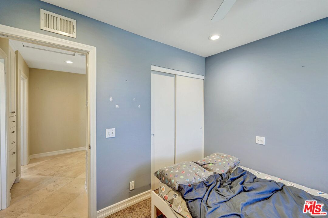 2868 Rutgers Place Oceanside, CA 92056 - Photo 28 of 34 a living room with furniture and a table