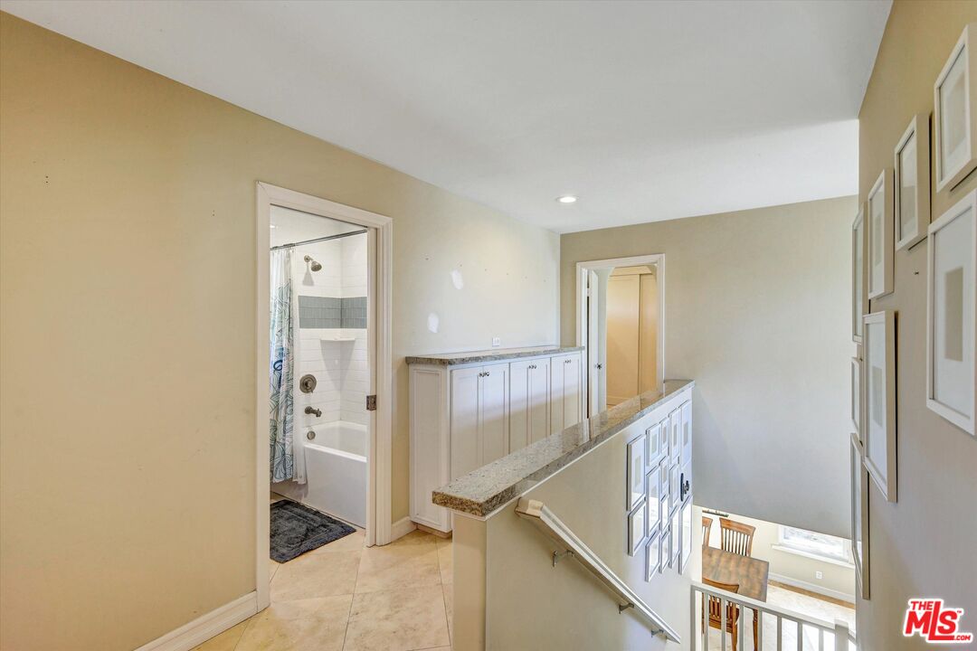 2868 Rutgers Place Oceanside, CA 92056 - Photo 29 of 34 a view of a hallway with windows and entryway