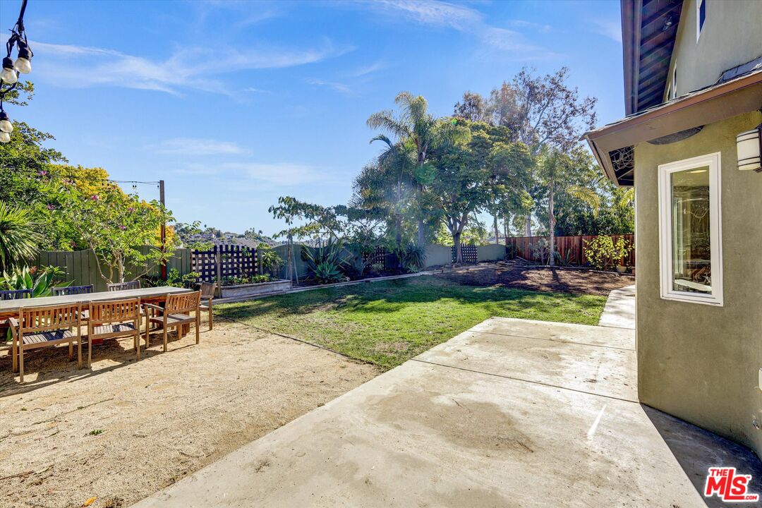 2868 Rutgers Place Oceanside, CA 92056 - Photo 30 of 34 a view of backyard with a garden and entertaining space