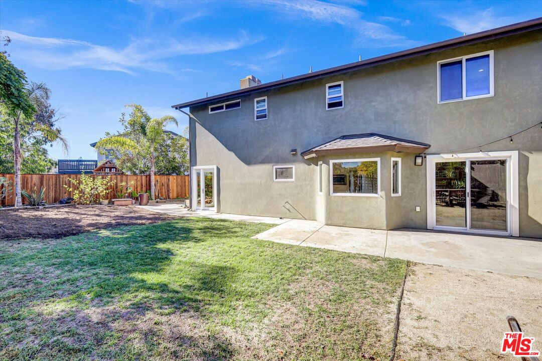 2868 Rutgers Place Oceanside, CA 92056 - Photo 32 of 34 a front view of a house with a yard