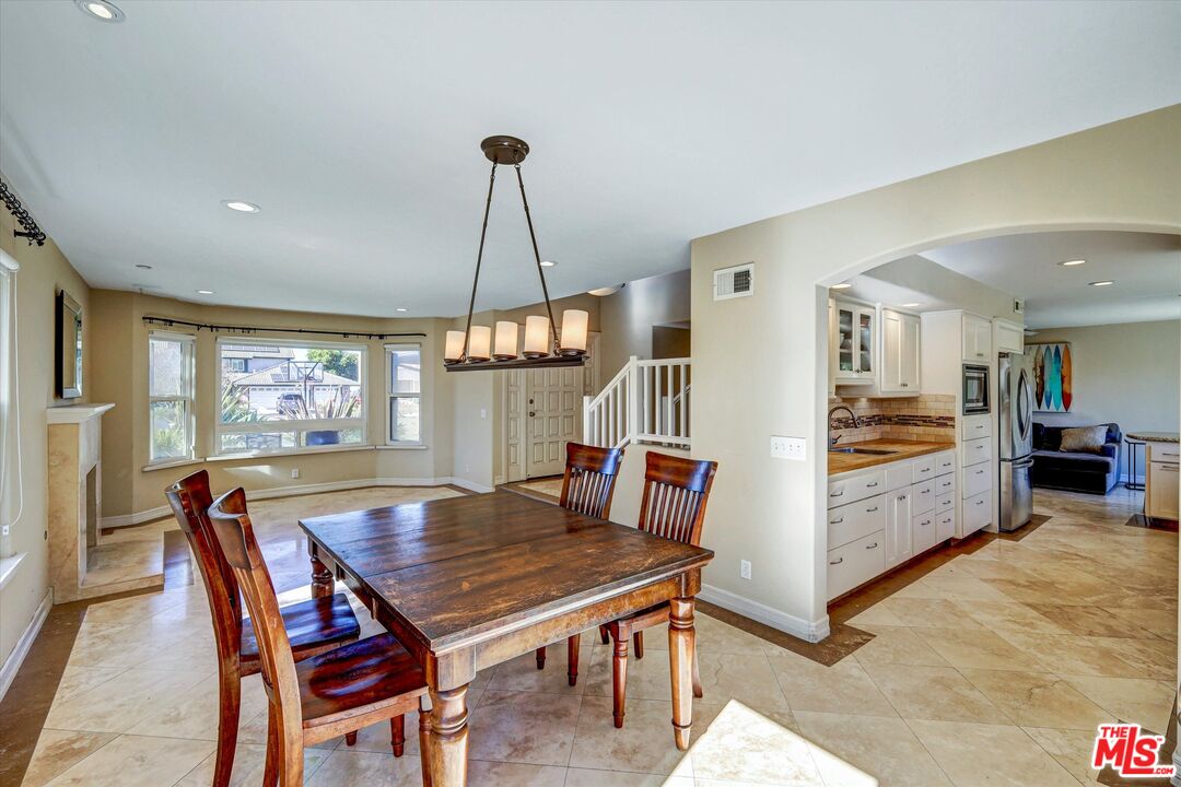 2868 Rutgers Place Oceanside, CA 92056 - Photo 7 of 34 a view of a dining room with furniture window and wooden floor
