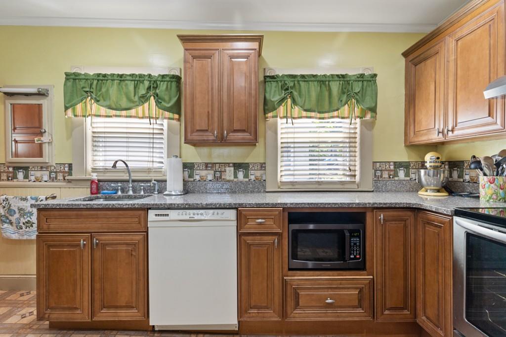 37 Alpine Street Somerville, MA 02144 - Photo 15 of 31 a kitchen with a sink and cabinets