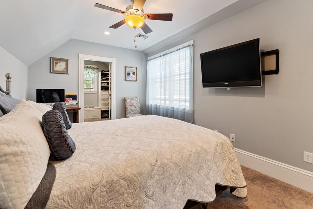 37 Alpine Street Somerville, MA 02144 - Photo 25 of 31 a bedroom with a bed and a flat screen tv