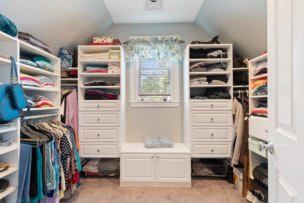 37 Alpine Street Somerville, MA 02144 - Photo 27 of 31 a view of walk in closet with clothes and shoes