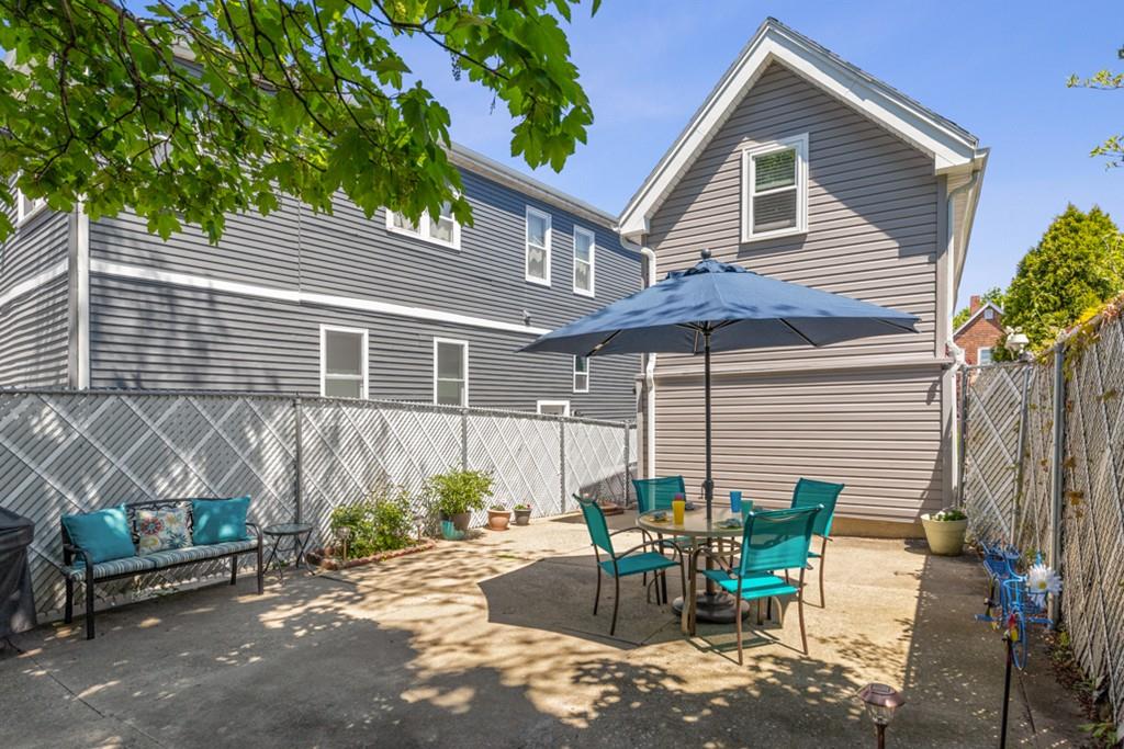 37 Alpine Street Somerville, MA 02144 - Photo 30 of 31 a view of a house with a patio