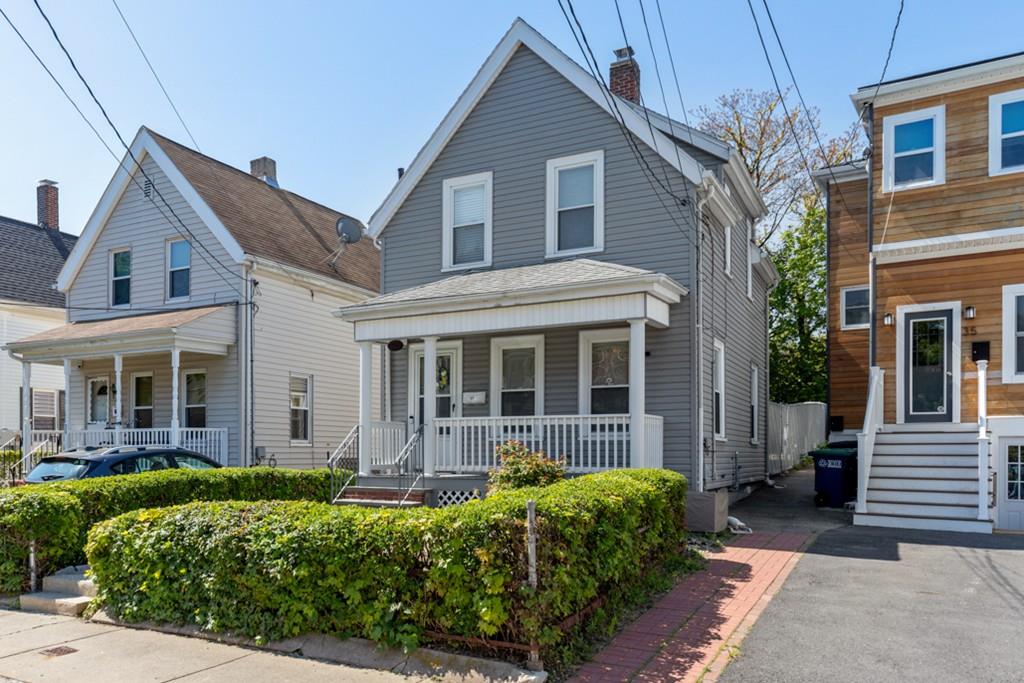 37 Alpine Street Somerville, MA 02144 - Photo 3 of 31 a front view of a house with garden