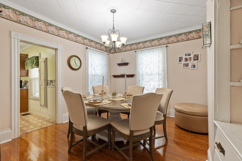 37 Alpine Street Somerville, MA 02144 - Photo 10 of 31 a view of a dining room with furniture and a chandelier