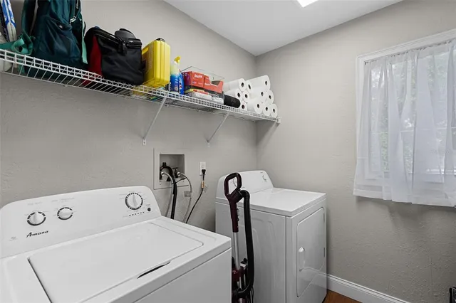 a utility room with dryer and washer