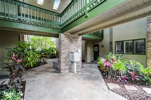 a front view of a house with a porch